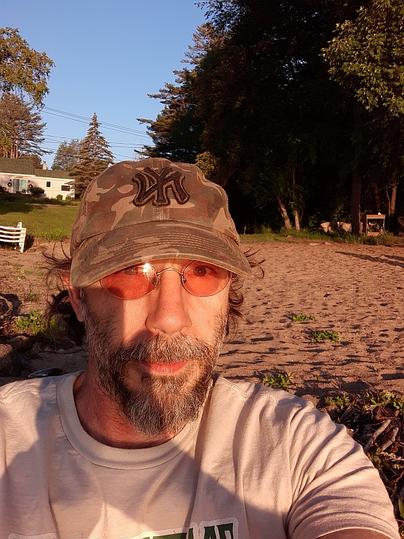 I am Paul McLean on a beach on the Great Sacandaga Lake June 12, 2021 8:01 pm
